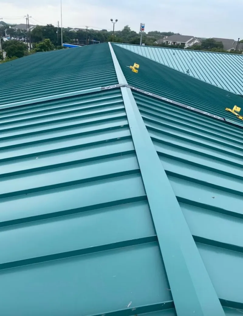 Green commercial metal roof ridge and valley for Metal Roof Repair in Ellettsville