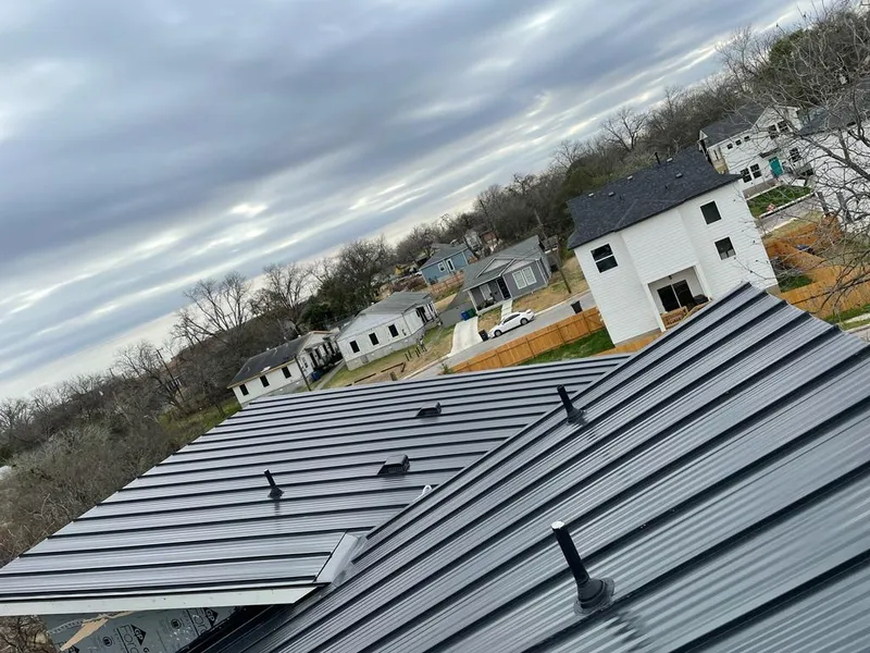Standing seam metal roof panels with vents for Skylight Repair in Ellettsville
